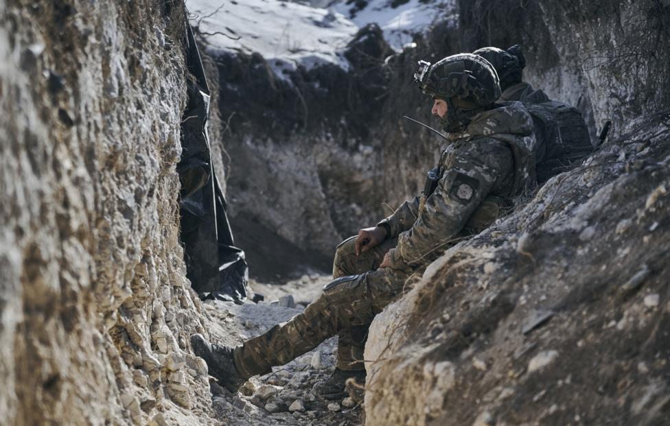 AP Photo/ Libkos