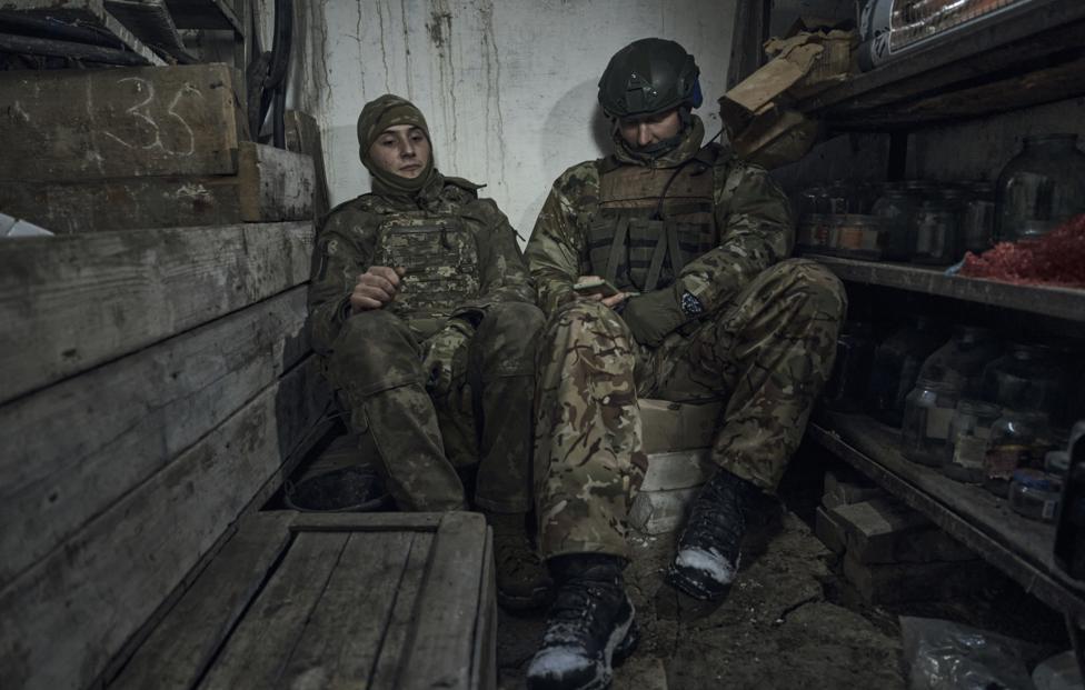 AP Photo/ Libkos