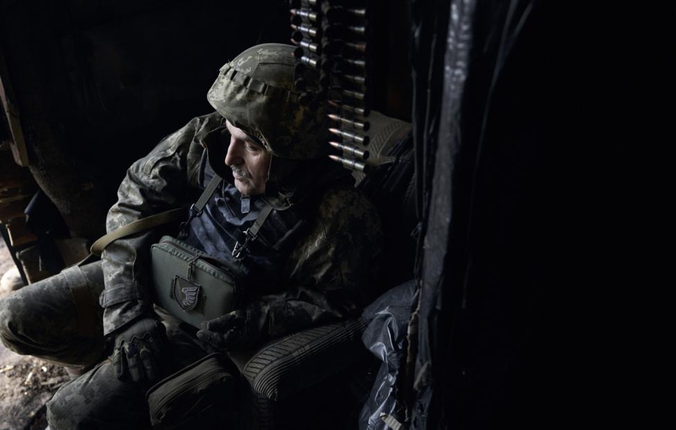 AP Photo/ Libkos