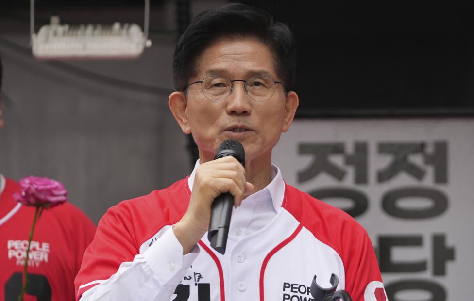 Ким Мун Су. AP Photo/ Lee Jin-man