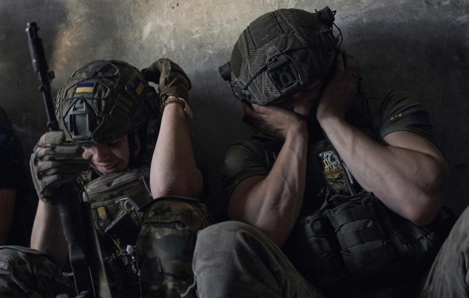 AP Photo/ Libkos