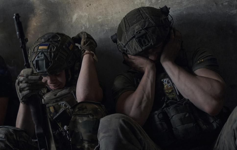 AP Photo/ Libkos