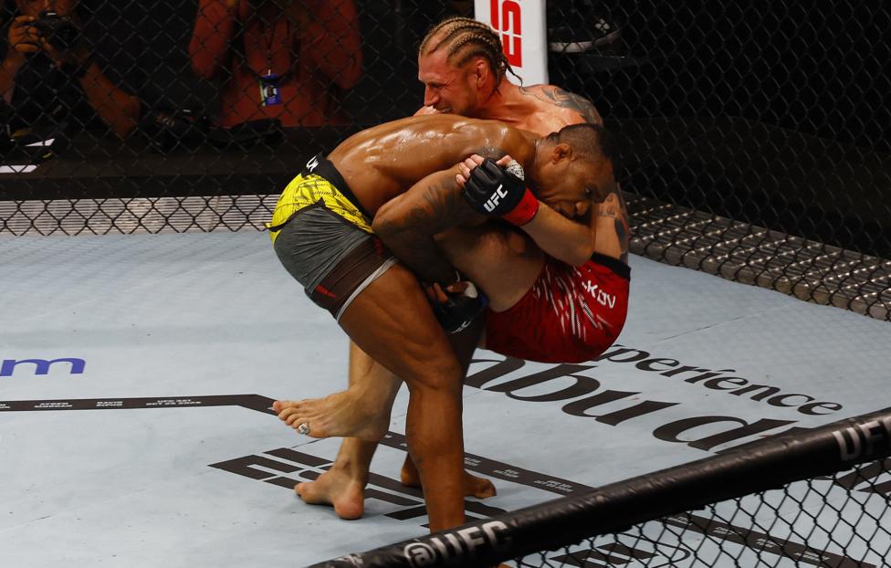 Жаилтон Алмейда и Александр Волков REUTERS/ Rula Rouhana